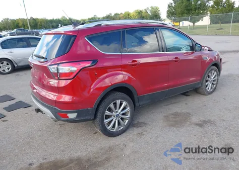 2018 Ford Escape Titanium z USA, uszkodzony, nr VIN 1FMCU9J95JUD16776